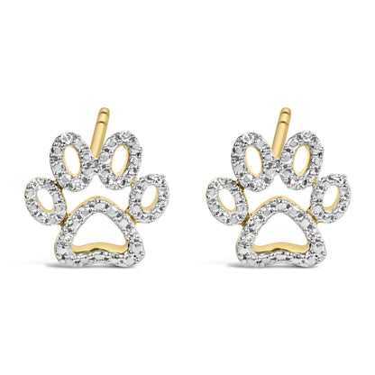 Close-up front view of a pair of yellow metal earrings shaped like stylized floral bows, adorned with multiple small white gemstones in prong settings.