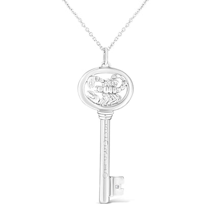 Front facing shot of a white metal key-shaped necklace pendant with a scorpion design inside the round top and one brownish round gemstone in a bezel setting near the bottom.