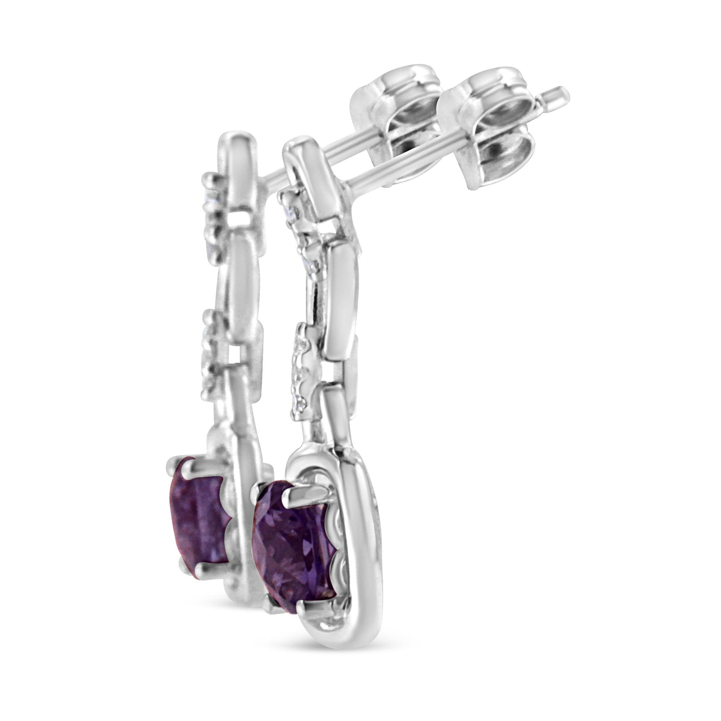 Close-up side angle of white metal hoop earrings featuring prong-set round white gemstones and cushion-shaped purple gemstones.