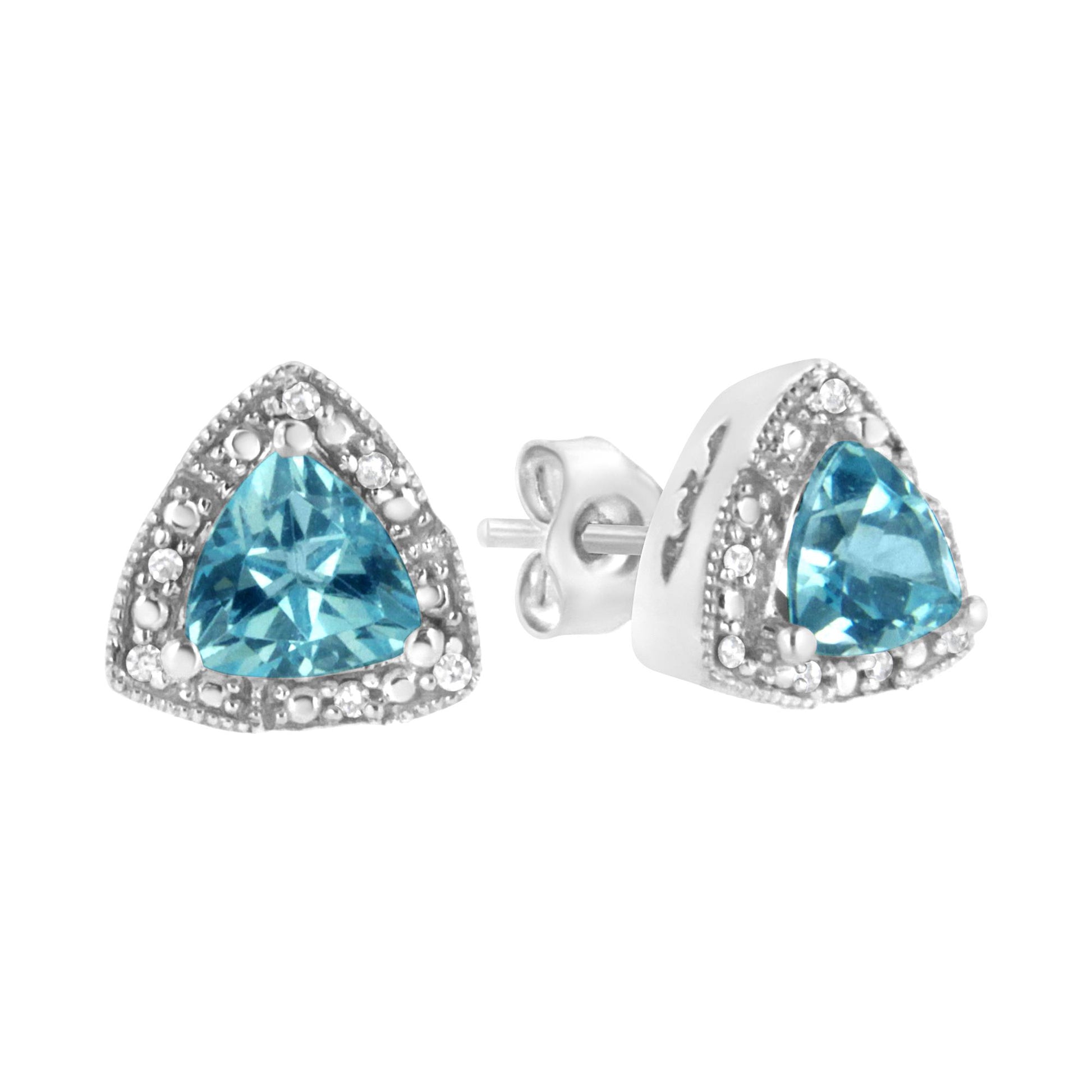 Pair of white metal stud earrings shown from the front and side angles, featuring a trillion-shaped blue gemstone surrounded by round white gemstones in prong settings.