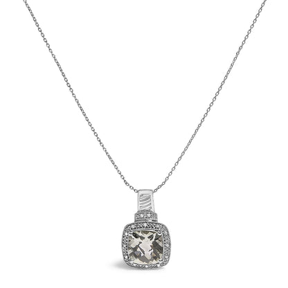 White metal necklace with a cushion-shaped green gemstone pendant surrounded by a pave setting of small white gemstones, shown in a front close-up angle.