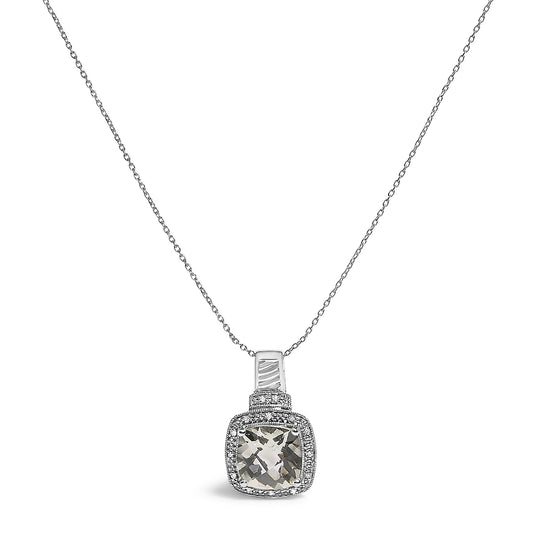 White metal necklace with a cushion-shaped green gemstone pendant surrounded by a pave setting of small white gemstones, shown in a front close-up angle.
