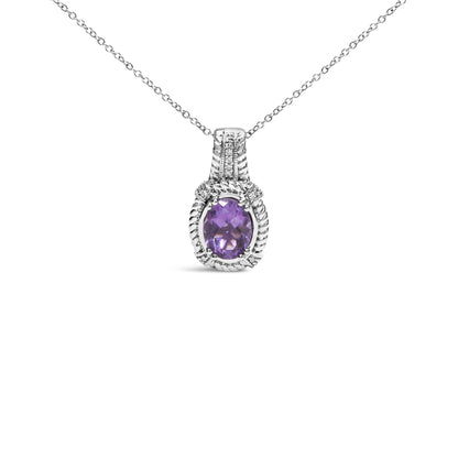Front view of a white metal necklace with an oval purple gemstone pendant surrounded by small round white gemstones in a pave setting.