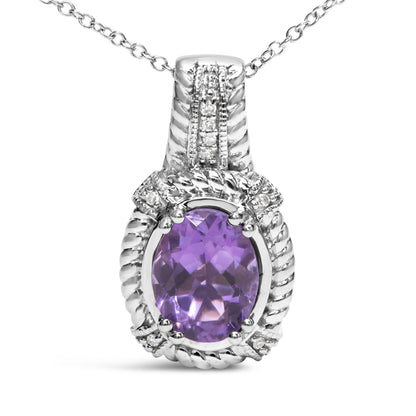 Close-up front angle of a white metal necklace pendant featuring a central oval purple gemstone surrounded by small round white gemstones in a pave setting.