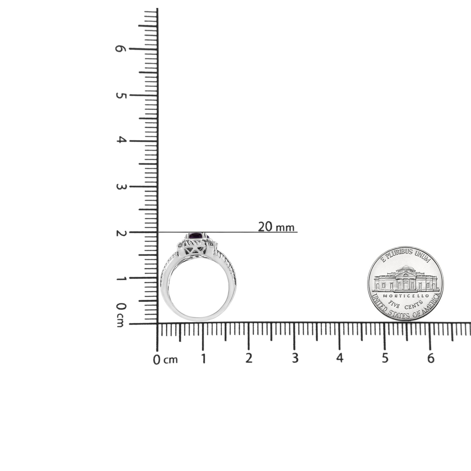 Side view of a white ring with an oval purple gemstone in prong setting and round white gemstones in pave setting, placed on a ruler for size reference.