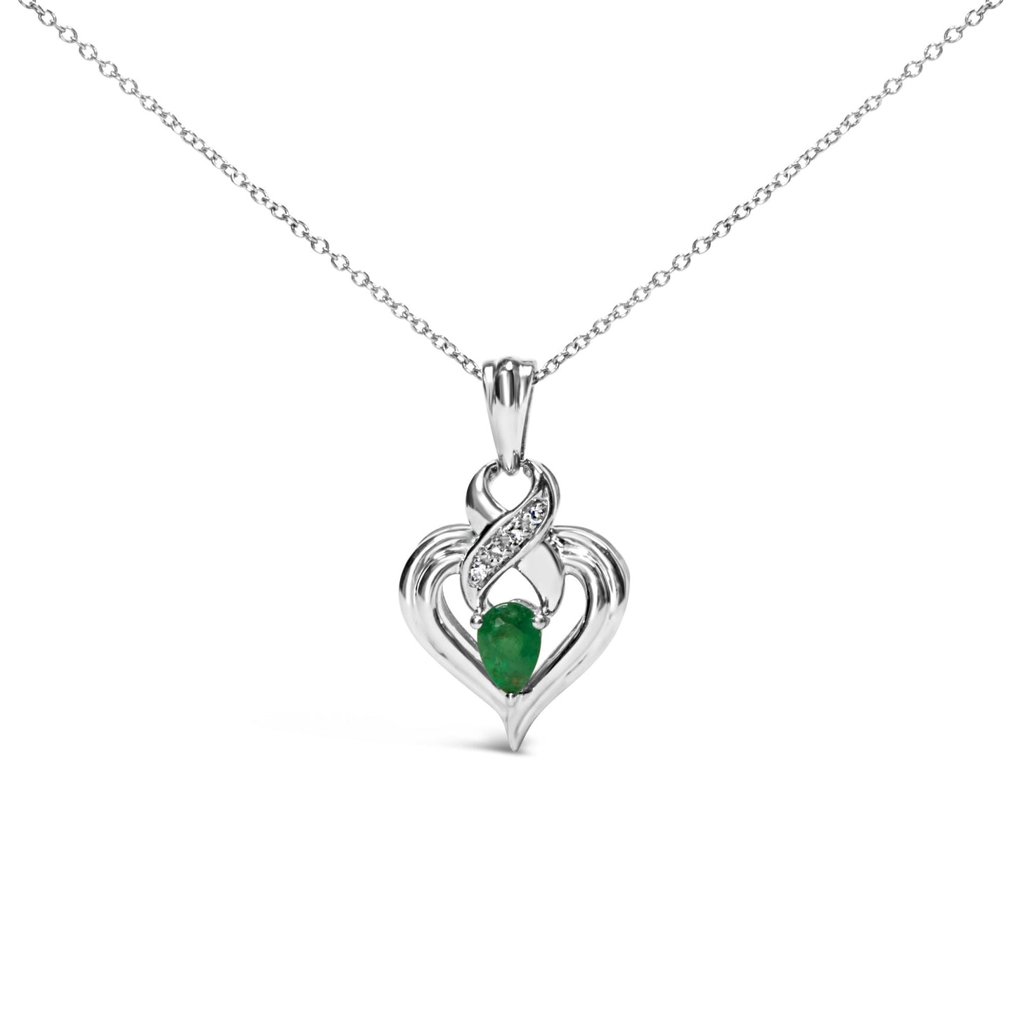 Front view of a white metal heart-shaped necklace pendant with a pear-shaped green gemstone at the center and a curved section above set with four small round white gemstones, hanging on a delicate white metal chain.