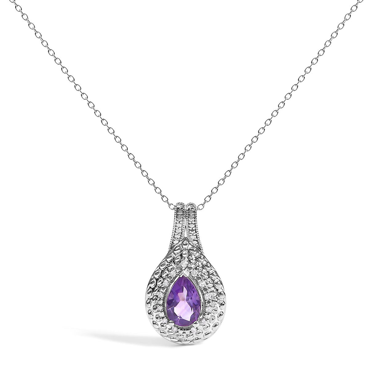 Close-up front view of a white metal necklace with a pear-shaped purple gemstone pendant surrounded by small white gemstones in a pave setting.