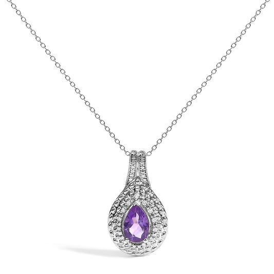 Close-up front view of a white metal necklace with a pear-shaped purple gemstone pendant surrounded by small white gemstones in a pave setting.