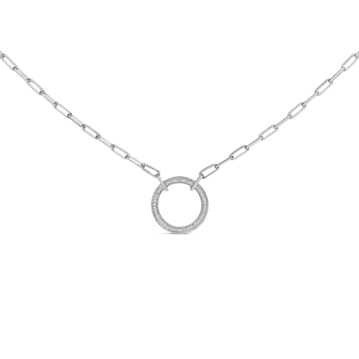 Close-up front view of a white metal necklace with a circular pendant featuring pave set round white gemstones, shown on a white background.