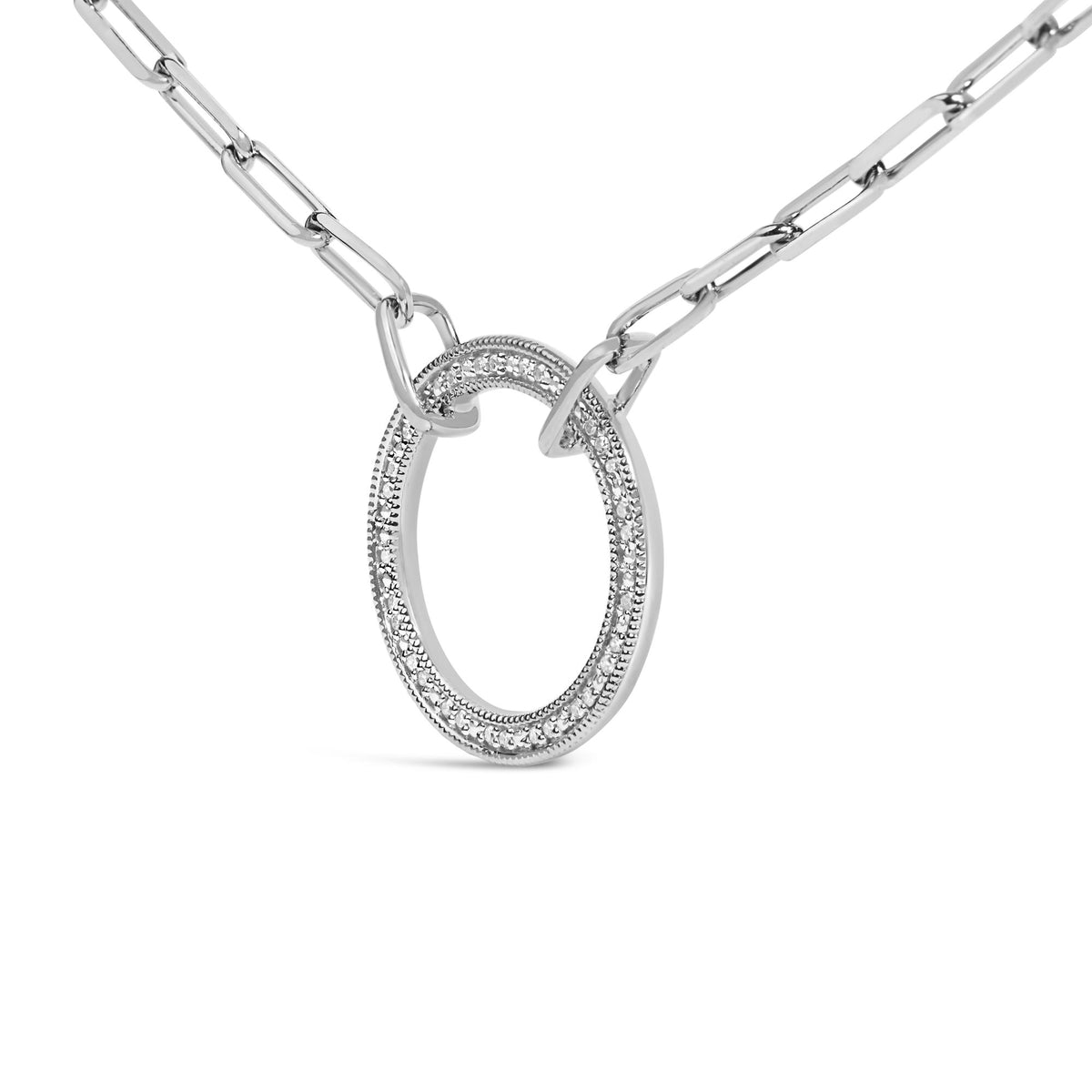 Close-up front angle of a white metal necklace with an oval-shaped pendant featuring pave-set round white gemstones, shown on a white background.
