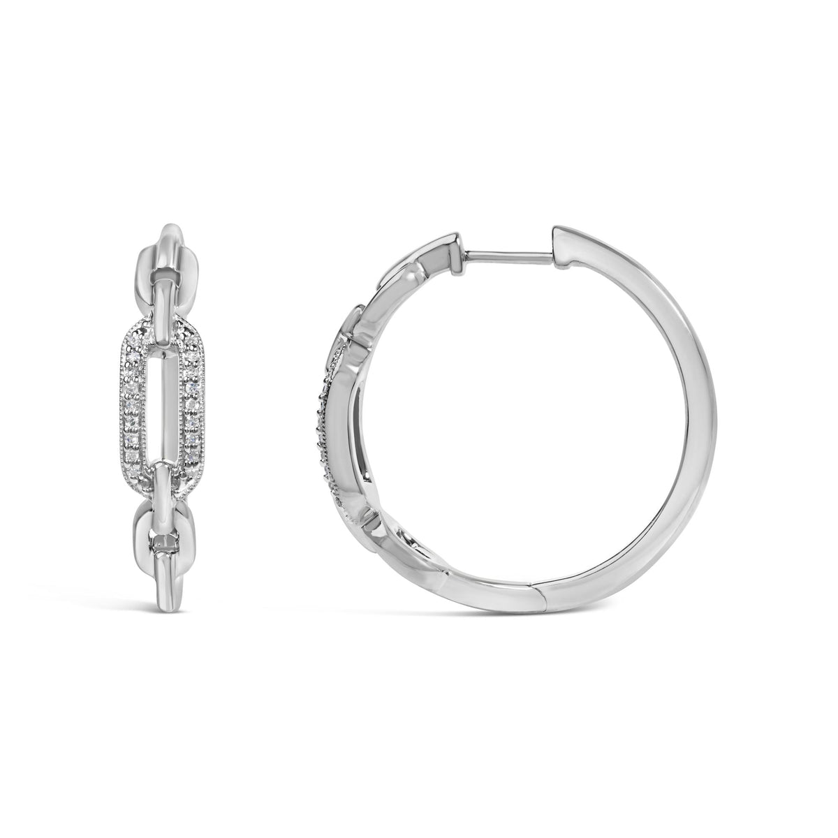 Close-up front angle of a pair of white metal earrings, one is a hoop with pave set white gemstones and the other is a linked chain segment with pave set white gemstones, shown on a white background.