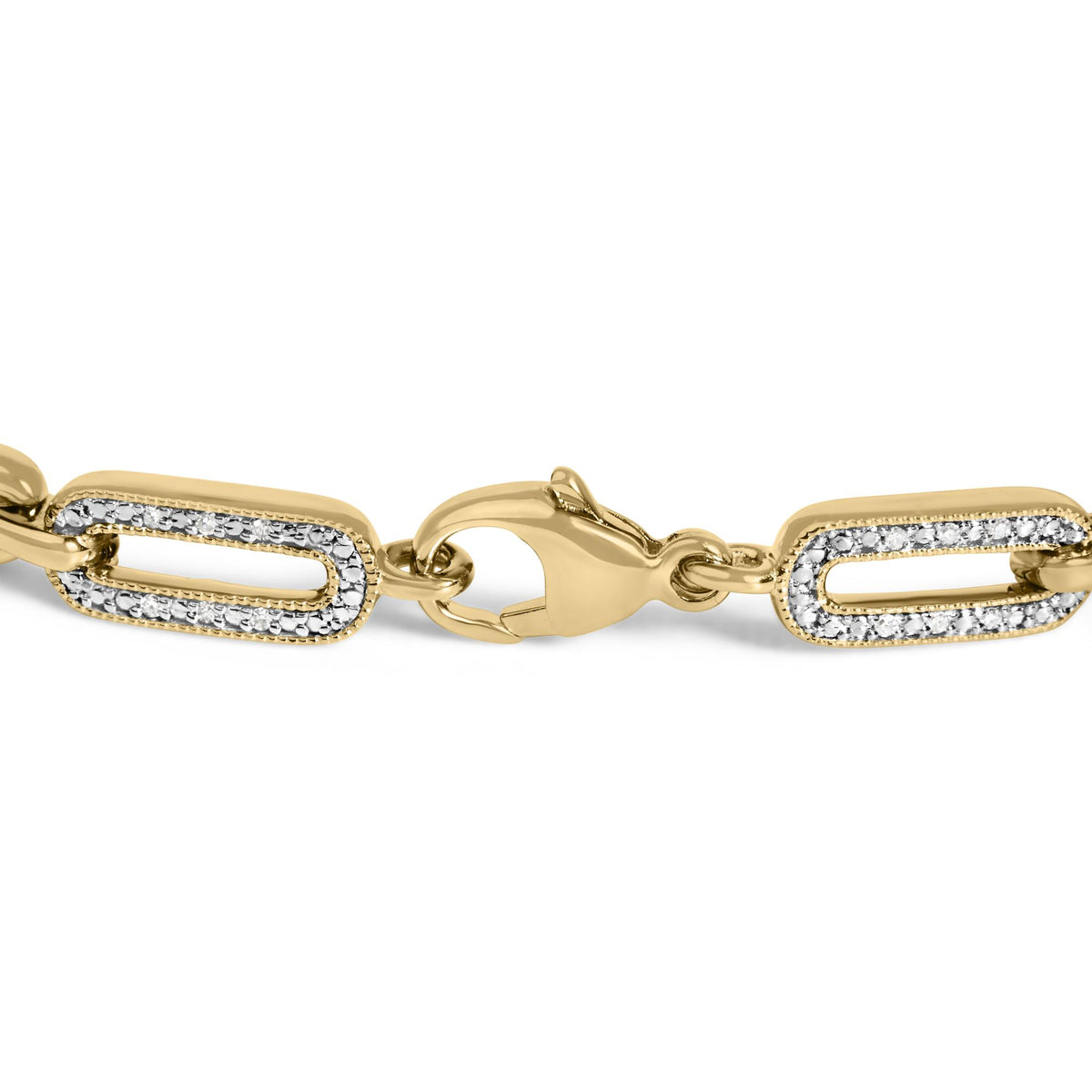 Close-up front-angle view of a yellow metal bracelet with oval-shaped links, each outlined with pavé-set white gemstones, featuring a clasp in the center.
