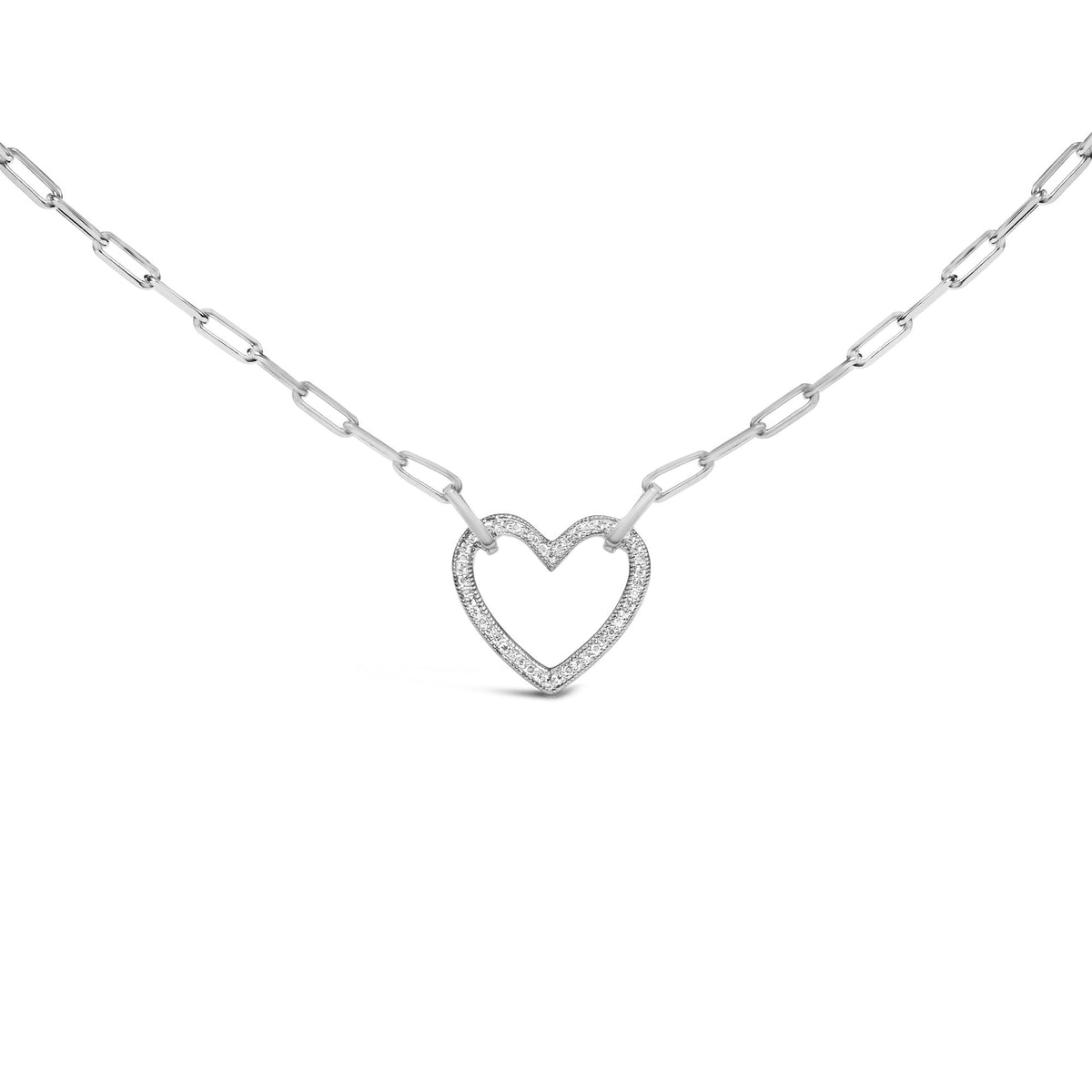 Close-up front view of a white metal necklace with a heart-shaped pendant paved with round white gemstones, shown on a white background.