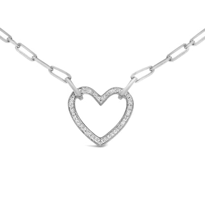 Close-up front view of a white metal necklace with a heart-shaped pendant featuring round white gemstones in a pave setting. The necklace is shown on a white background.