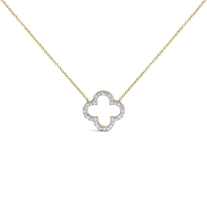 Close-up front view of a yellow metal necklace with a curved floral-shaped pendant outlined with white round gemstones in prong setting, shown on a white background.