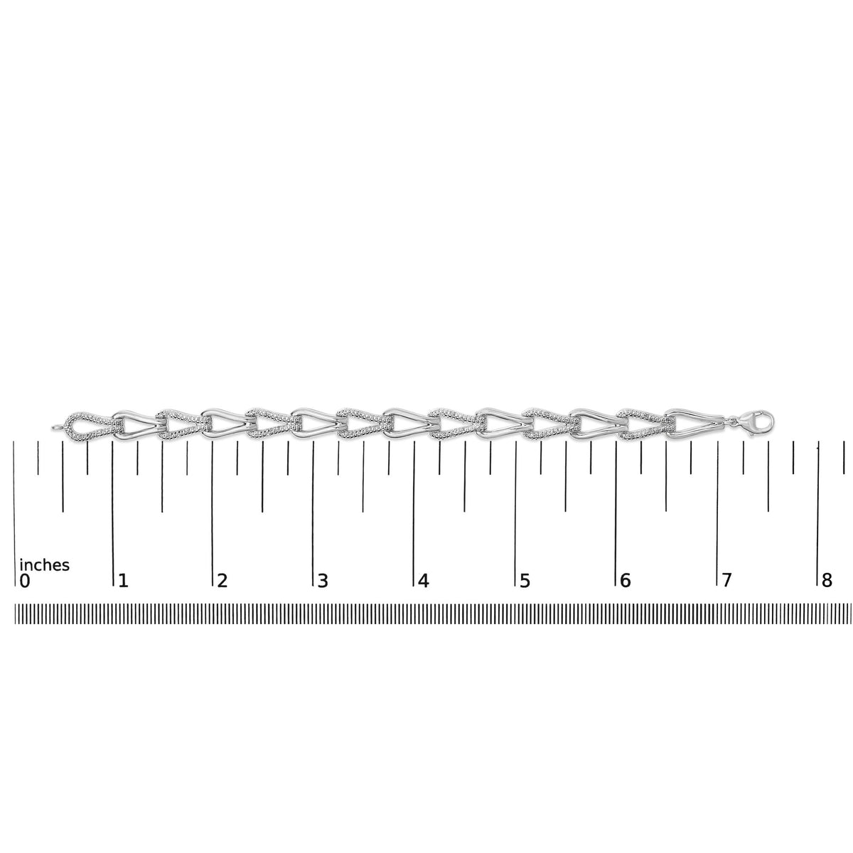 Bracelet shown on a scale, white metal with alternating smooth and pave-set white gemstones in a linked pattern, top-down angle.