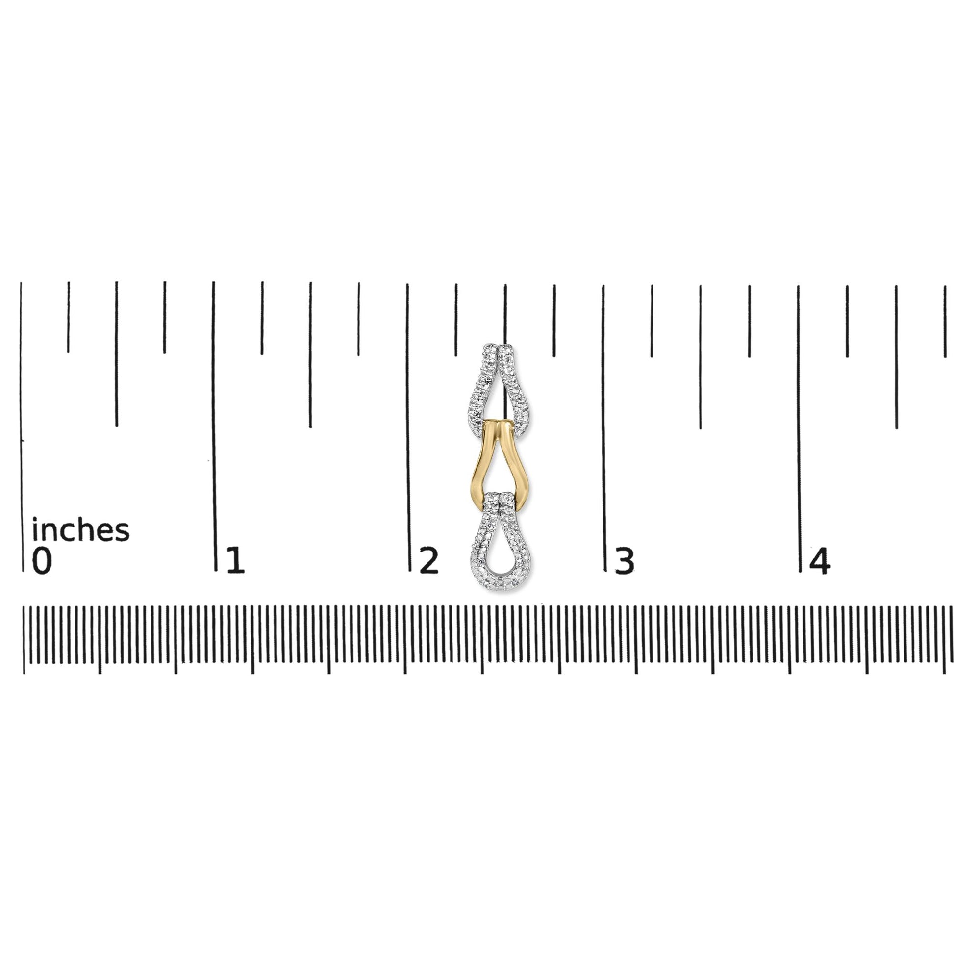 Front view of Gold vermeil 1/10 cttw diamond knot link earring showing pave diamond detail on inch ruler for scale
