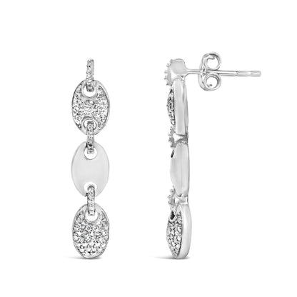 Close-up front and side view of white metal drop earrings with linked oval shapes, some pavé set with round white gemstones, shown on a white background.
