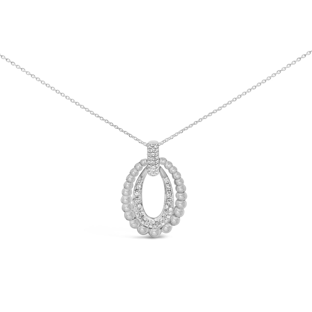 Close-up front view of a white metal necklace with a drop-shaped pendant featuring round white gemstones in a pave setting.