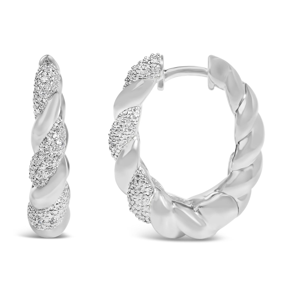 Close-up front view of a pair of white metal hoop earrings with a twisted design alternating smooth and pave-set sections with small white gemstones.