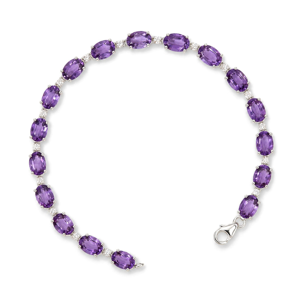 Close-up angled view of a white metal bracelet featuring alternating oval purple gemstones and round white gemstones in prong settings, with a clasp visible at one end, shown on a white background.