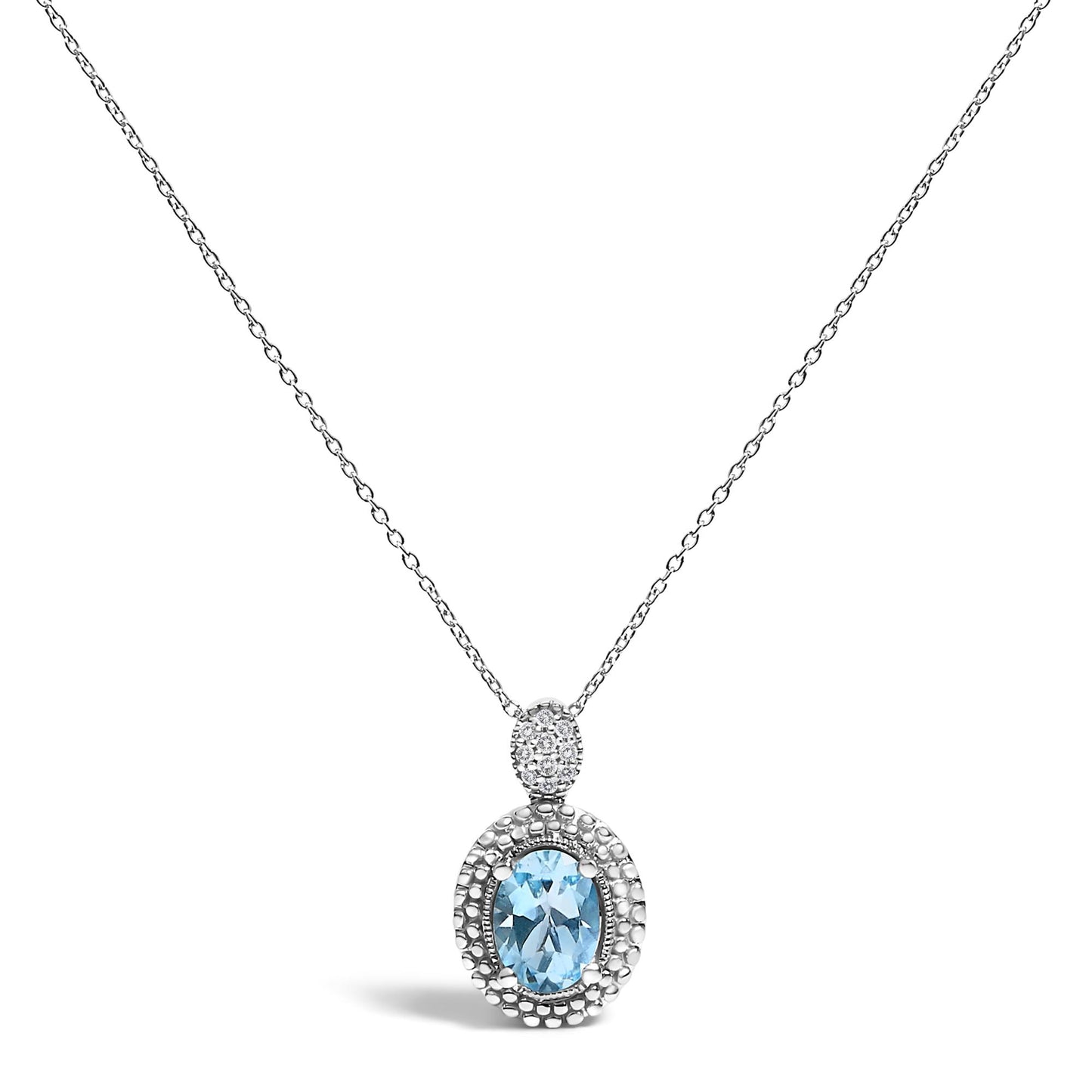 White metal necklace with a pendant featuring an oval-shaped blue gemstone surrounded by a halo of small white gemstones in a pave setting, shown in a front-facing view.
