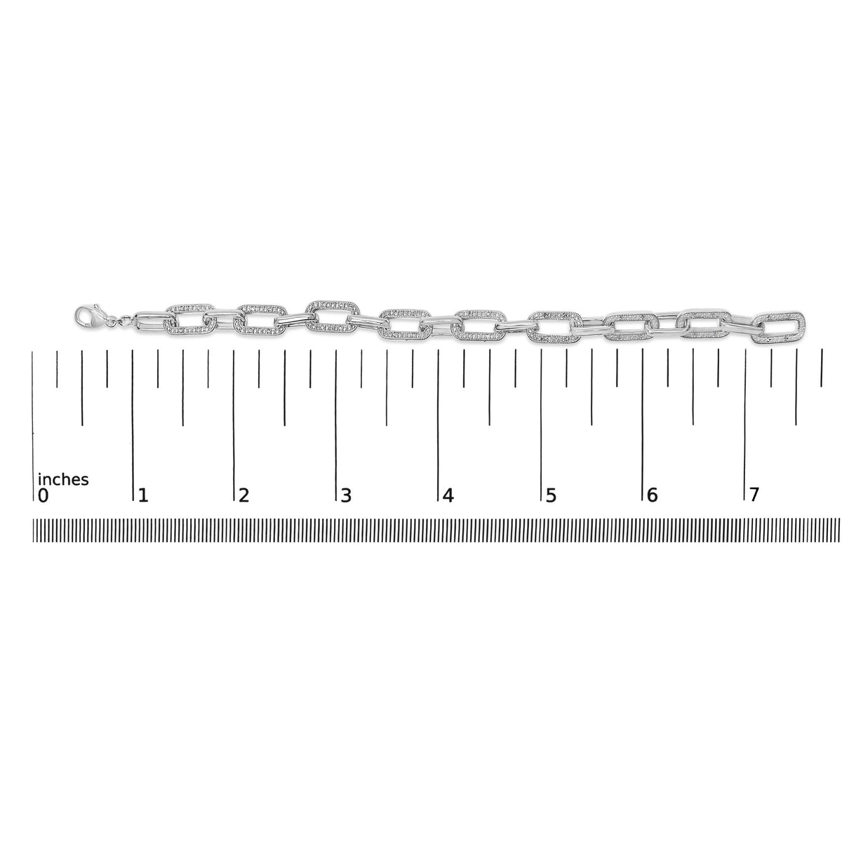 White metal bracelet with alternating plain and gemstone-set rectangular links shown flat on a ruler, shot from the front.
