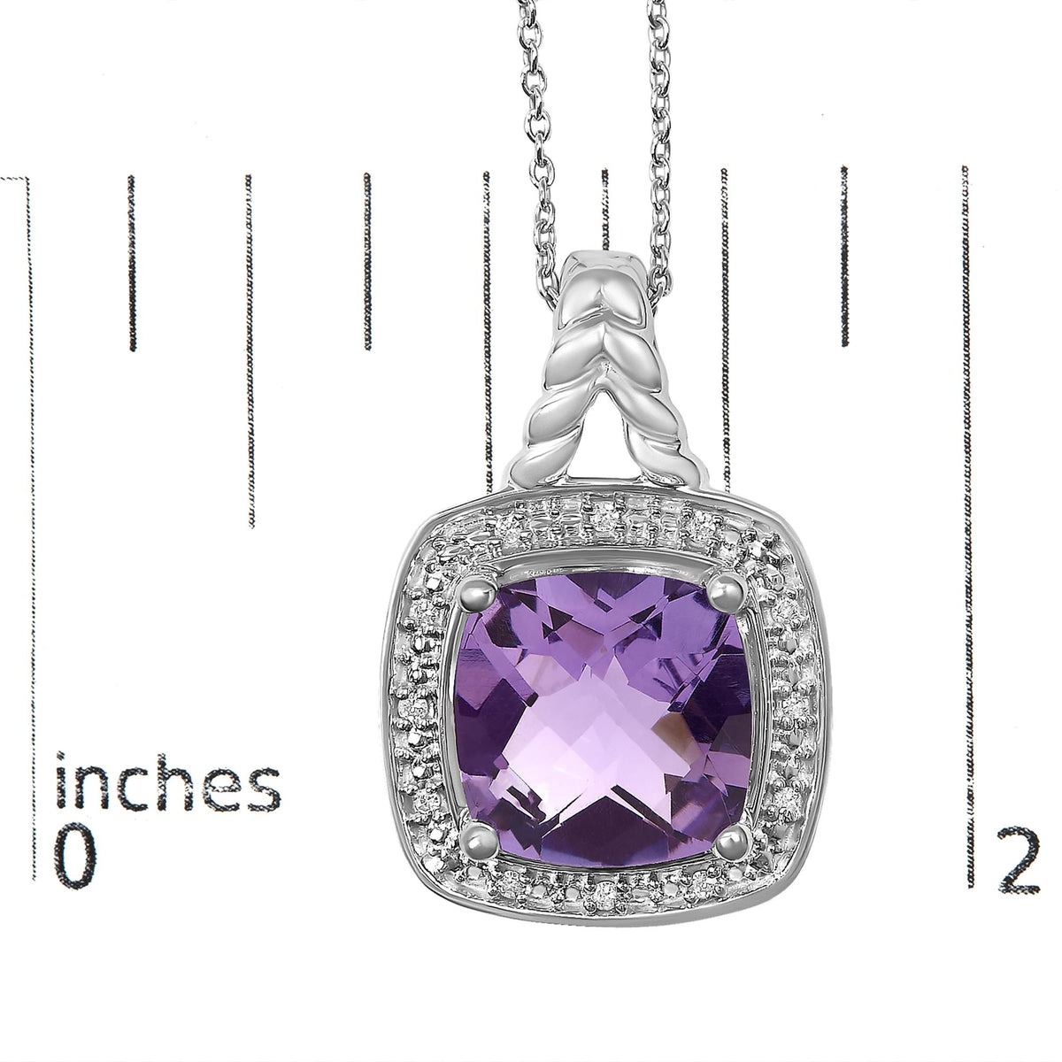 Close-up front view of a white necklace pendant featuring a cushion-shaped purple gemstone in a prong setting, surrounded by a halo of round white gemstones in pave settings, shown on a measurement scale.