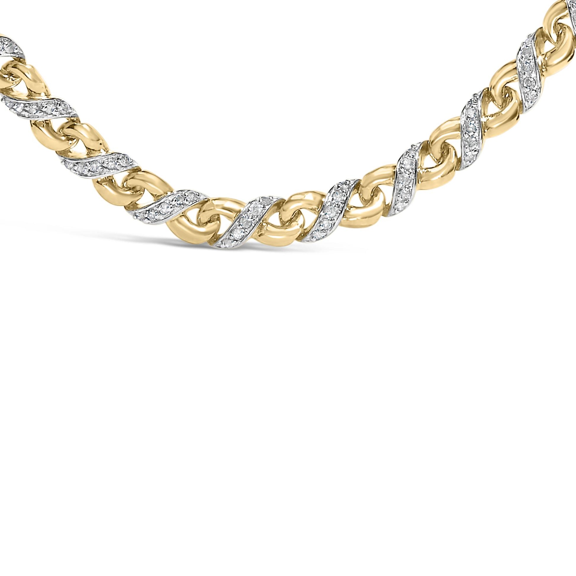 Close-up front angle of a yellow metal necklace with alternating smooth links and links wrapped in white gemstones in a prong setting.