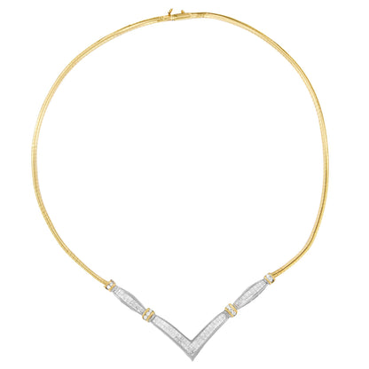 Front view of a V-shaped necklace with a yellow metal band and white metal segments set with white round and square gemstones.