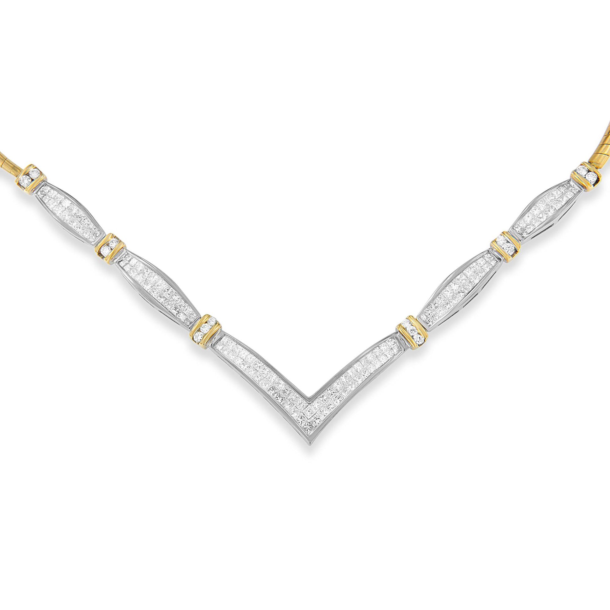 Close-up, front-facing view of a necklace with a V-shaped design featuring white and yellow metal. The necklace is adorned with white gemstones in round shapes set in channel settings and princess shapes in invisible settings throughout.