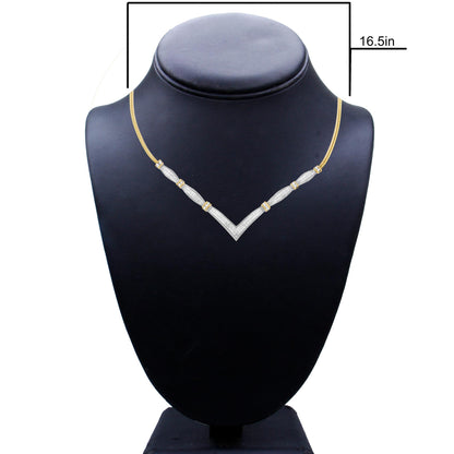 Front view of a yellow and white necklace on a black display bust, featuring a V-shaped design with sections set with white round and princess shape gemstones.
