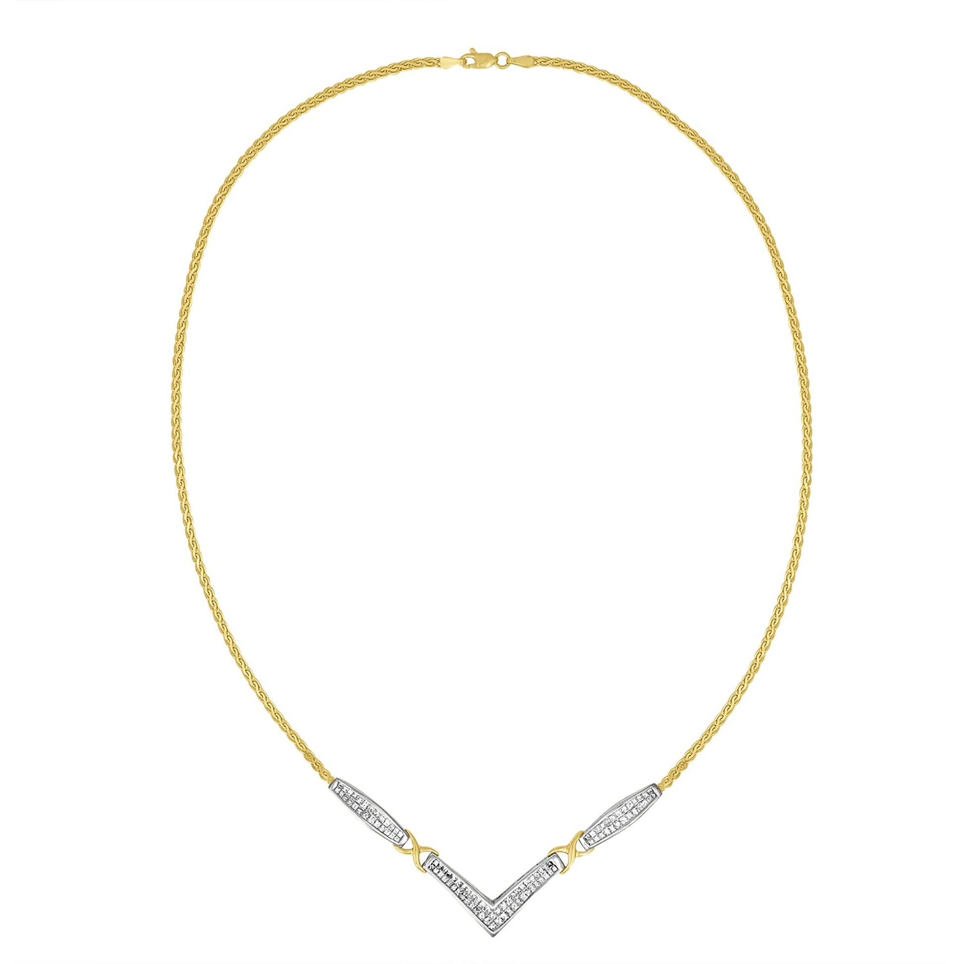 Front-facing image of a yellow and white metal necklace with a V-shaped pendant and sections adorned with white gemstones in an invisible setting.