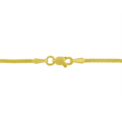 Close-up side view of a yellow and white metal necklace clasp with no visible gemstones.