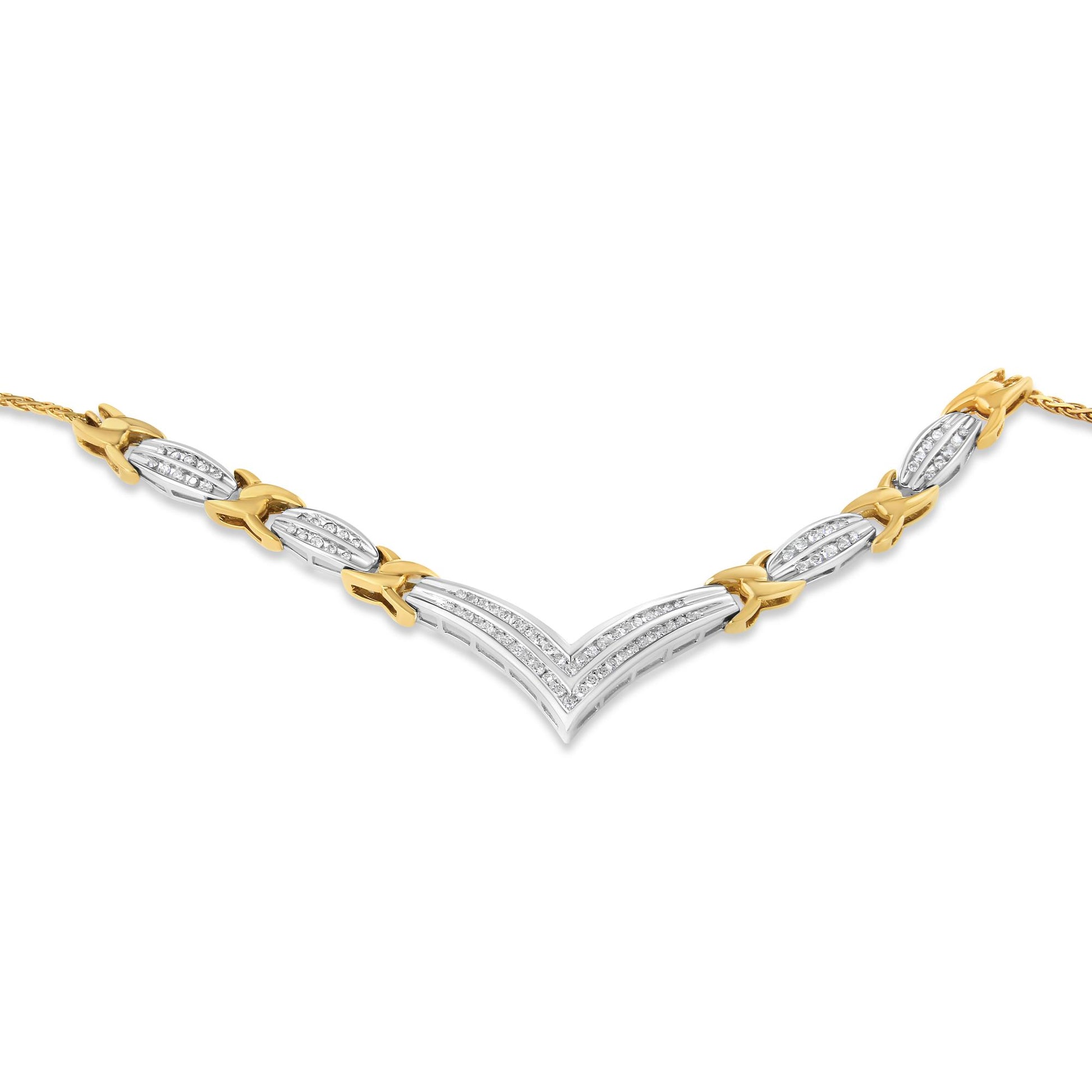 Close-up front angle of a yellow and white metal necklace featuring round white gemstones in channel settings with a V-shaped centerpiece and alternating links.