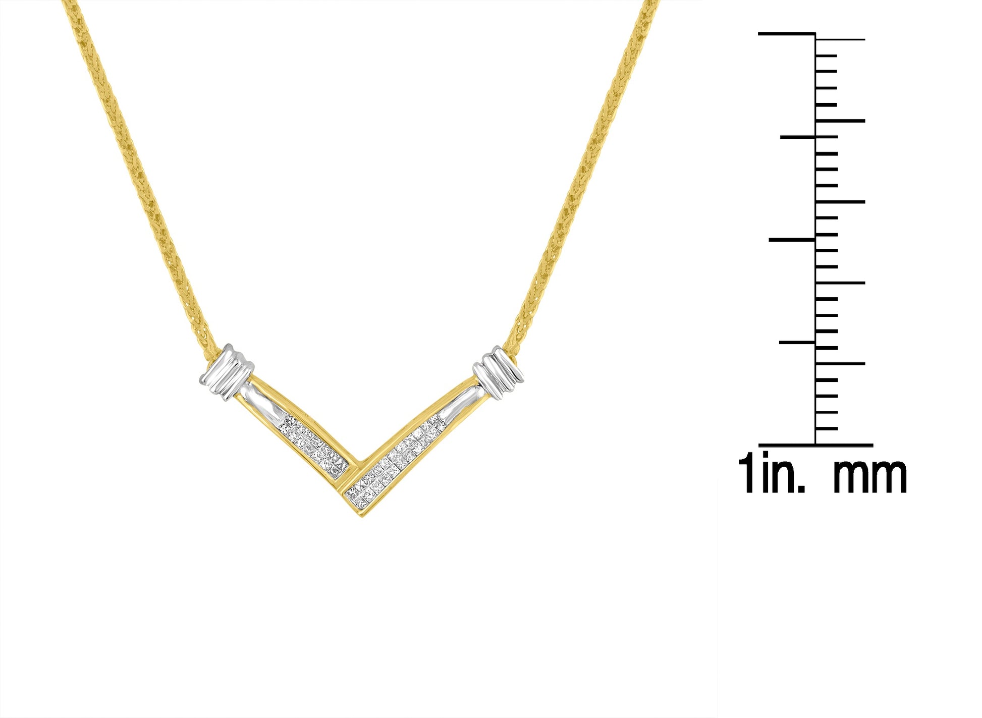 Close-up front view of a yellow and white metal necklace with a V-shaped pendant featuring white gemstones in a channel setting, displayed next to a ruler for size reference.
