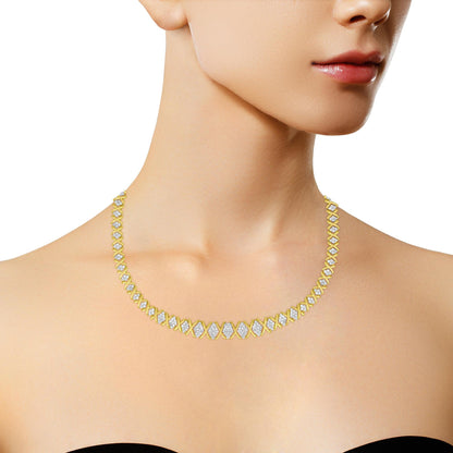 Close-up front angle of a model wearing a yellow necklace featuring interlinked segments with white round gemstones in pave setting.
