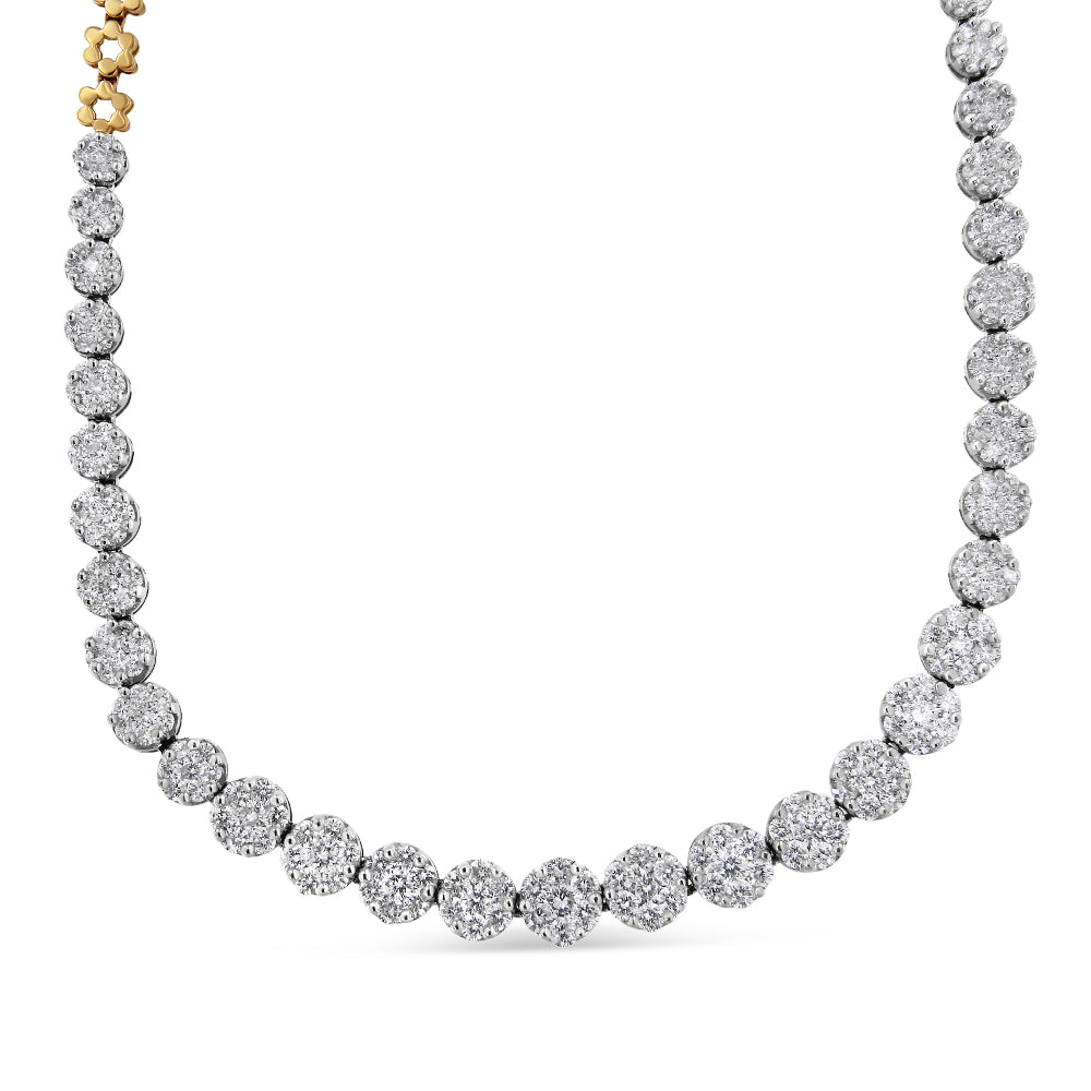 Close-up front view of a yellow metal necklace with round white gemstones in a pave setting forming a continuous chain.