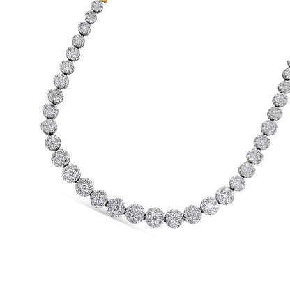 Close-up angled view of a yellow metal necklace featuring round-shaped clusters with white gemstones in pave setting.
