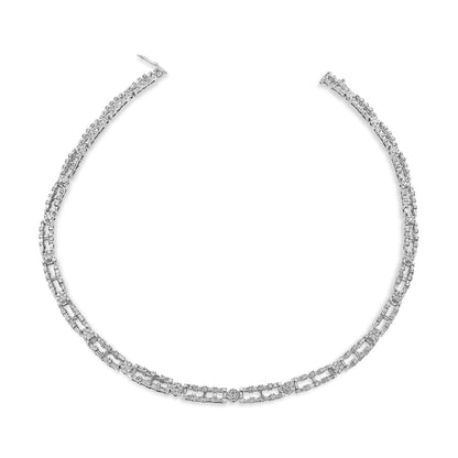 White metal necklace with alternating baguette-shaped prong-set and round channel-set white gemstones, shown from a top-down angle.