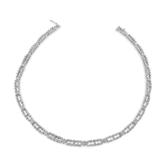 White metal necklace with alternating baguette-shaped prong-set and round channel-set white gemstones, shown from a top-down angle.
