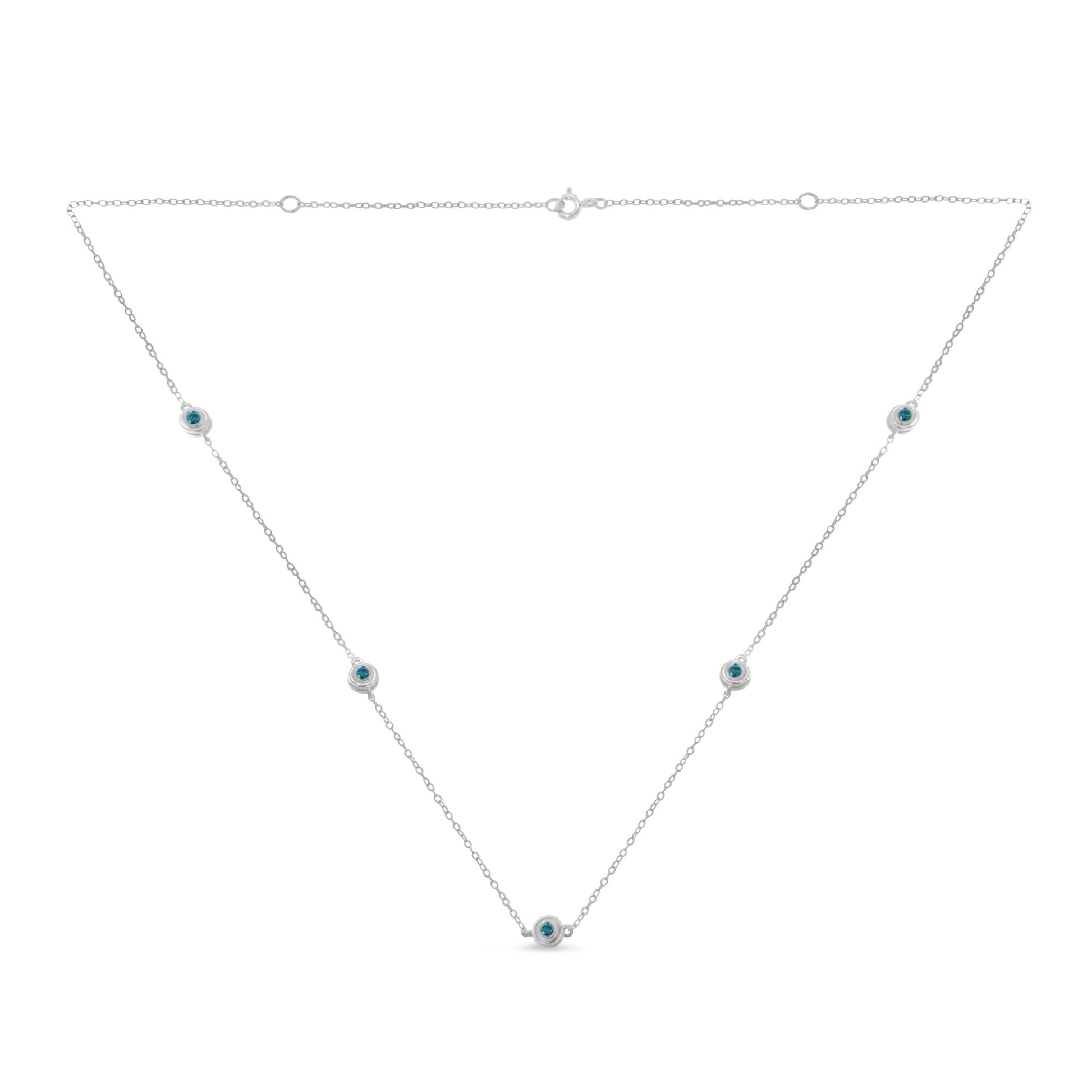 White metal necklace with round blue gemstones in bezel settings evenly spaced along the chain, shown flat from the front.