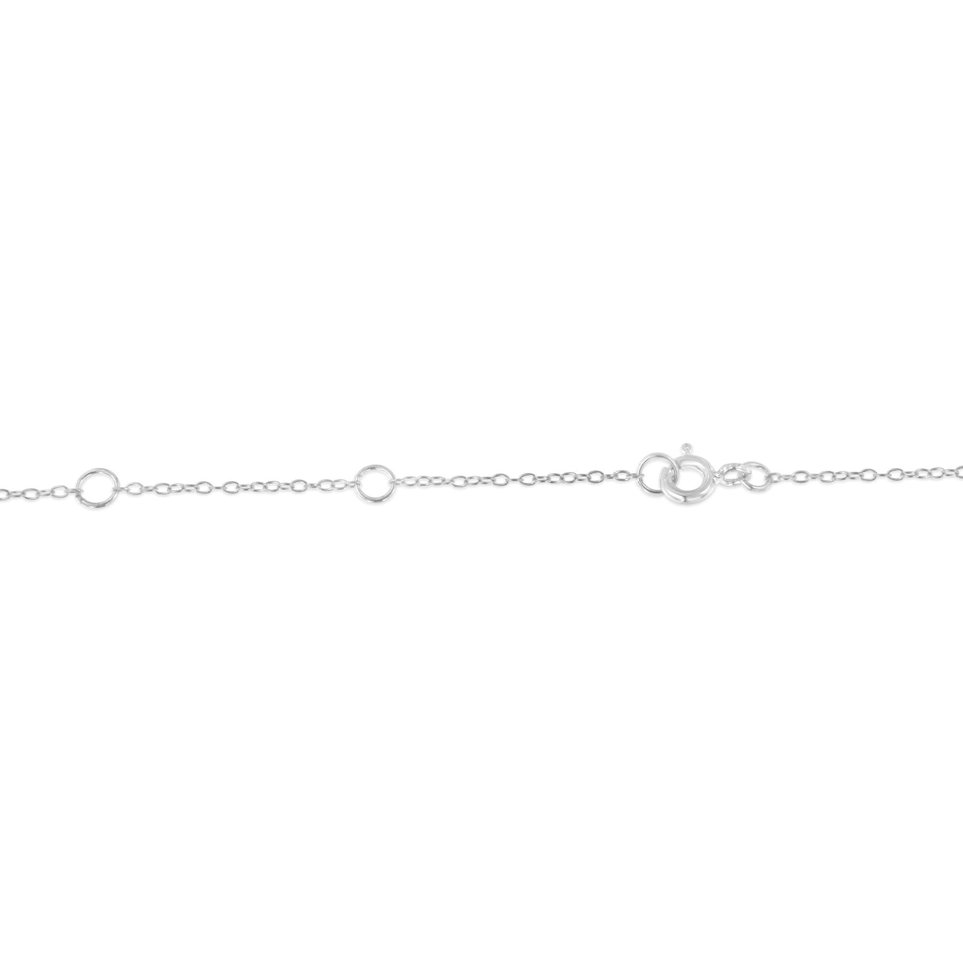White metal necklace chain with round bezel-set blue gemstones, shown in a close-up horizontal angle focusing on the clasp and chain links.