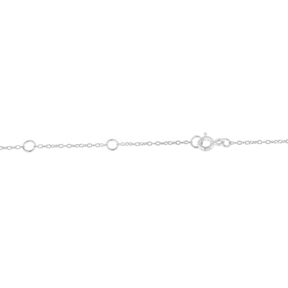 White metal necklace chain with round bezel-set blue gemstones, shown in a close-up horizontal angle focusing on the clasp and chain links.