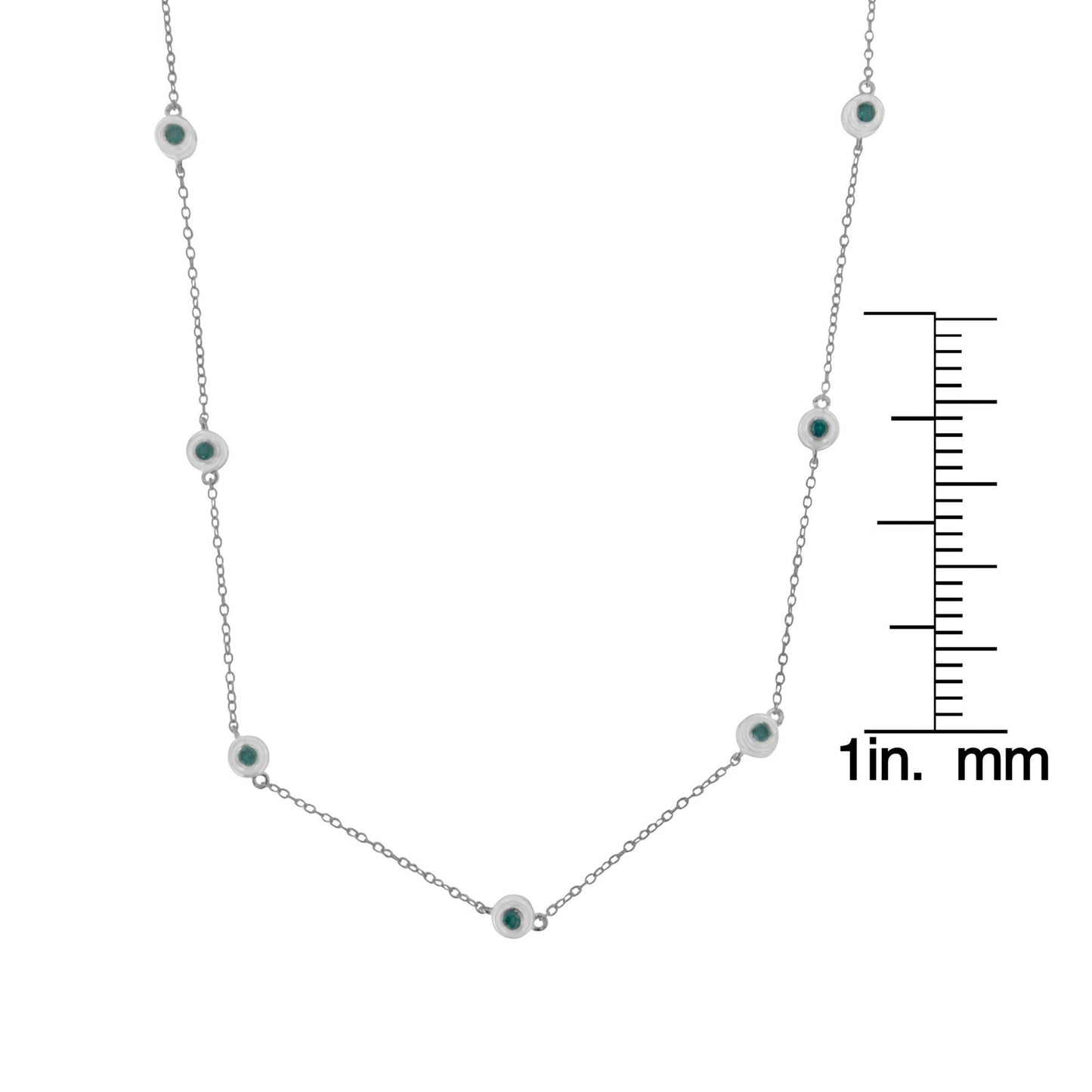White metal necklace with round bezel-set blue gemstones evenly spaced along the chain, shown against a white background with a ruler for size reference, front view.