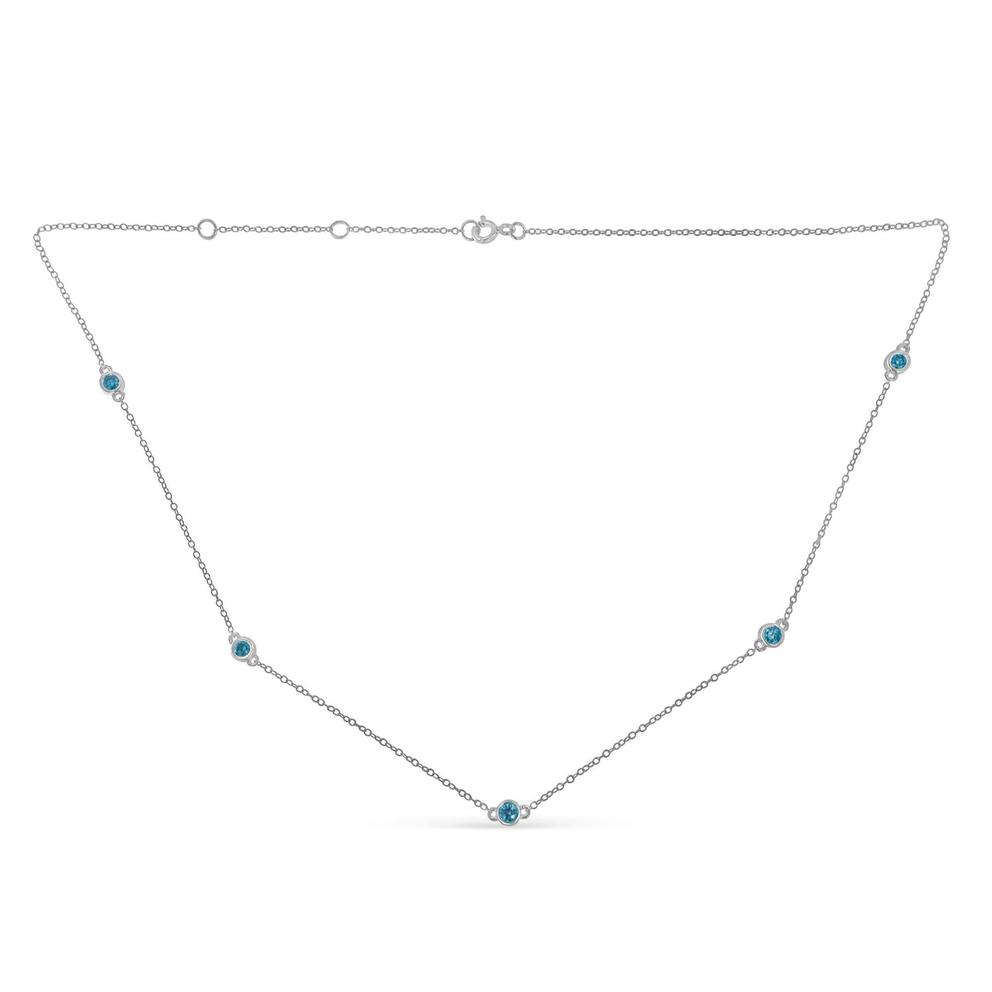 White necklace with round blue gemstones set in bezels along the chain, shown from a flat front angle.