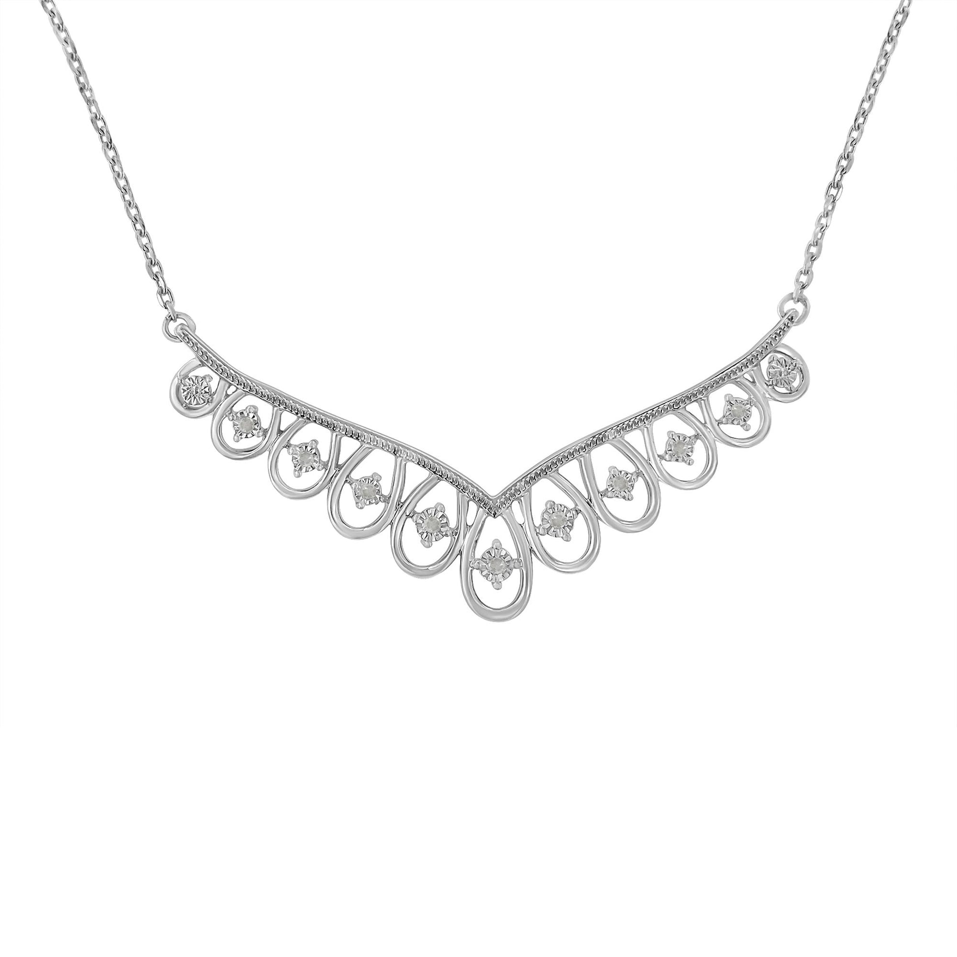 White metal necklace with a curved design featuring loops, each set with a round white gemstone in a miracle setting, shot from the front on a white background.