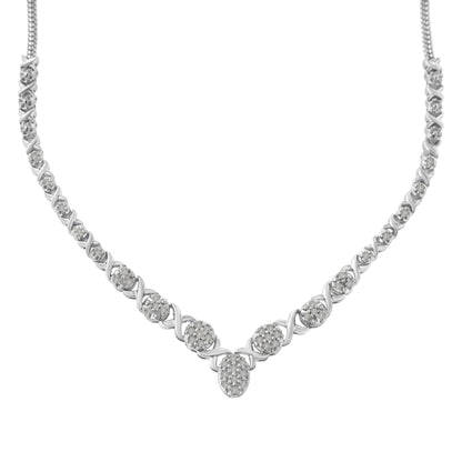 Front-facing view of a white metal necklace featuring round white gemstones in prong settings arranged in a pattern with curved links.