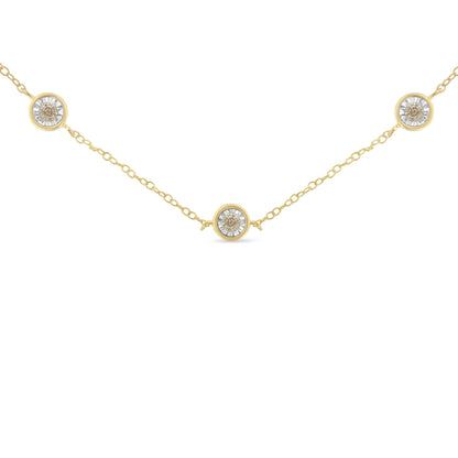 Yellow metal necklace with three round brownish gemstones in miracle settings, shown from a front-facing angle.