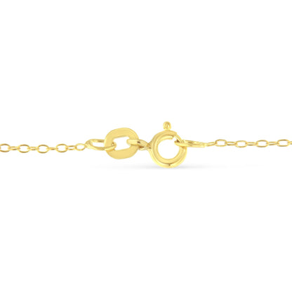 Close-up front view of yellow metal necklace clasp and chain links on white background.